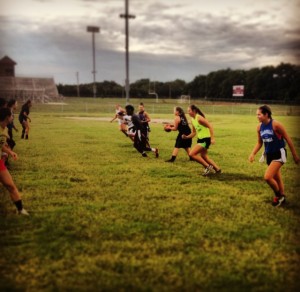 Playing flag football during conditioning.